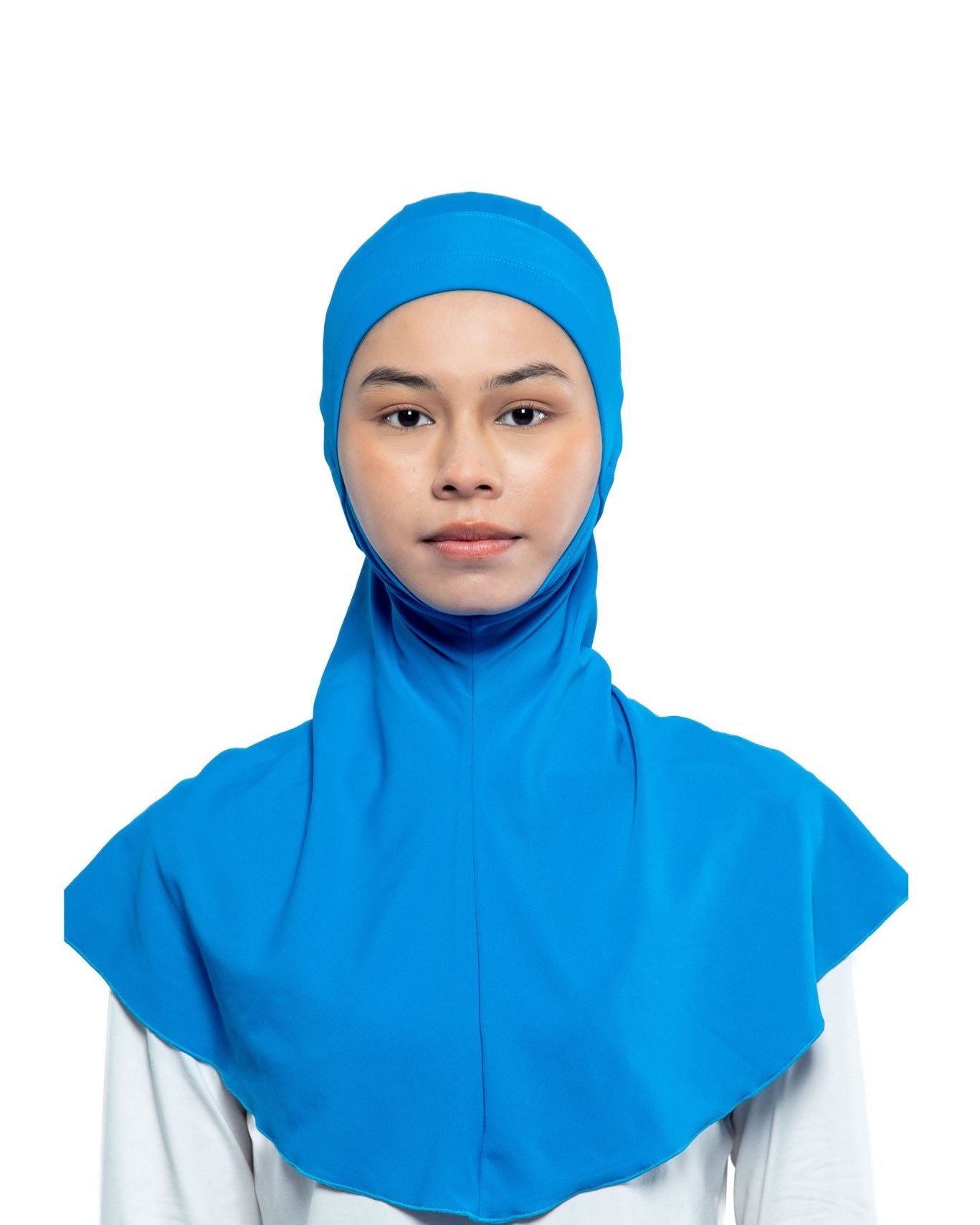 Person wearing a blue swim hijab on a white background